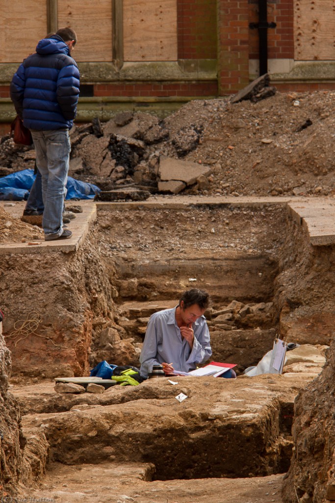 http://commons.wikimedia.org/wiki/File:Archaeologist_working_in_Trench.jpg