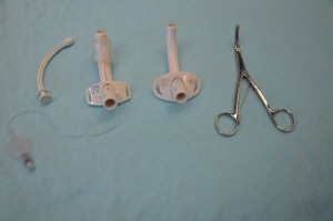 Figure 10.5.2 Left to right: Obturator, cuffed tracheostomy tube, non-cuffed tracheostomy tube, tracheal dilators