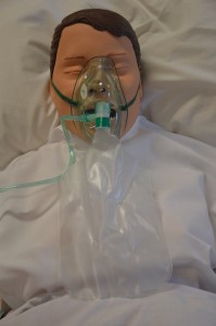 Partial re-breather mask