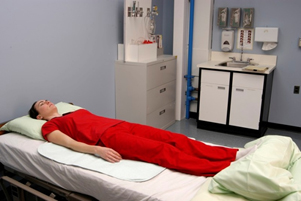 Exercises performed in a supine position. A) The patient lies supine in