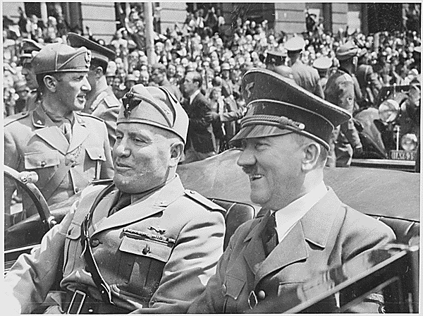 Adolf Hitler and Benite Mussolini riding in a car together