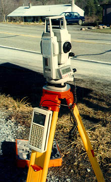 Photo of a Total station next to a road