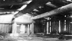 Despite efforts to rehouse Aboriginal people in Euro-Canadian structures, longhouses were still be built in the 20th century. This one is under construction in the Vancouver area around 1912. (Major J.S. Matthews, courtesy City of Vancouver Archives)