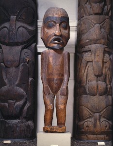 A 19th century potlatch "Speaker Figure." An announcer would have stood behind the figure, calling out the names of guests through the mouth. (Brooklyn Museum)