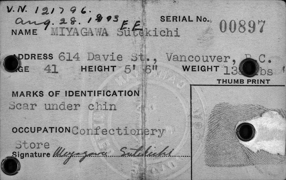 Internment identification card. Long description available.