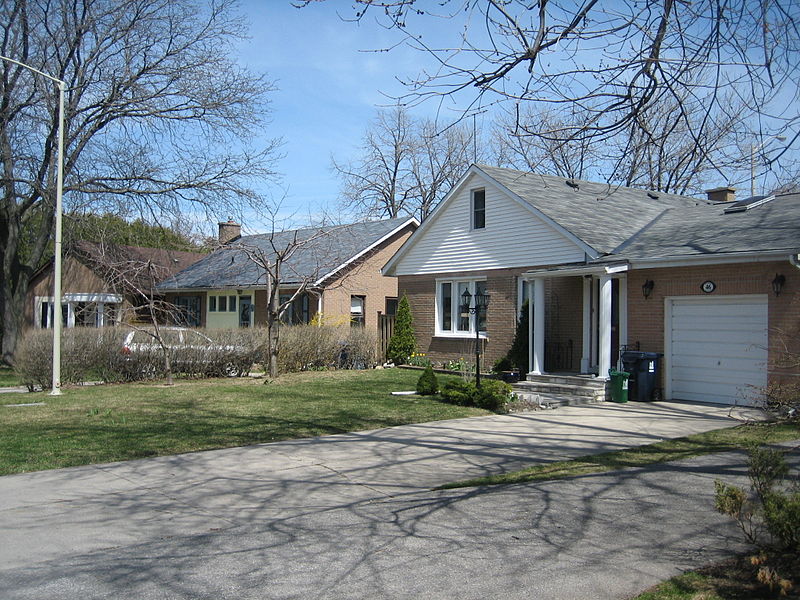 A row of similar suburban houses.