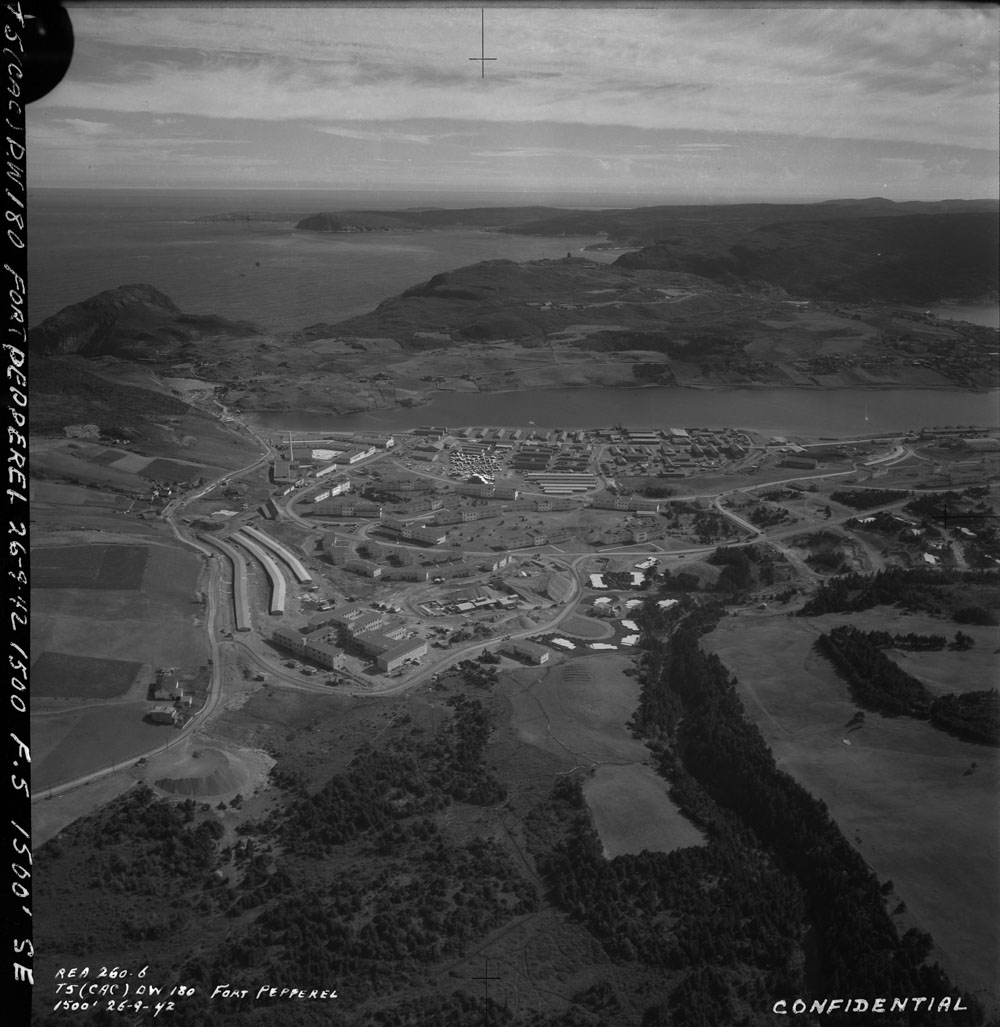 Aerial view of an air force base, with barracks and various buildings.