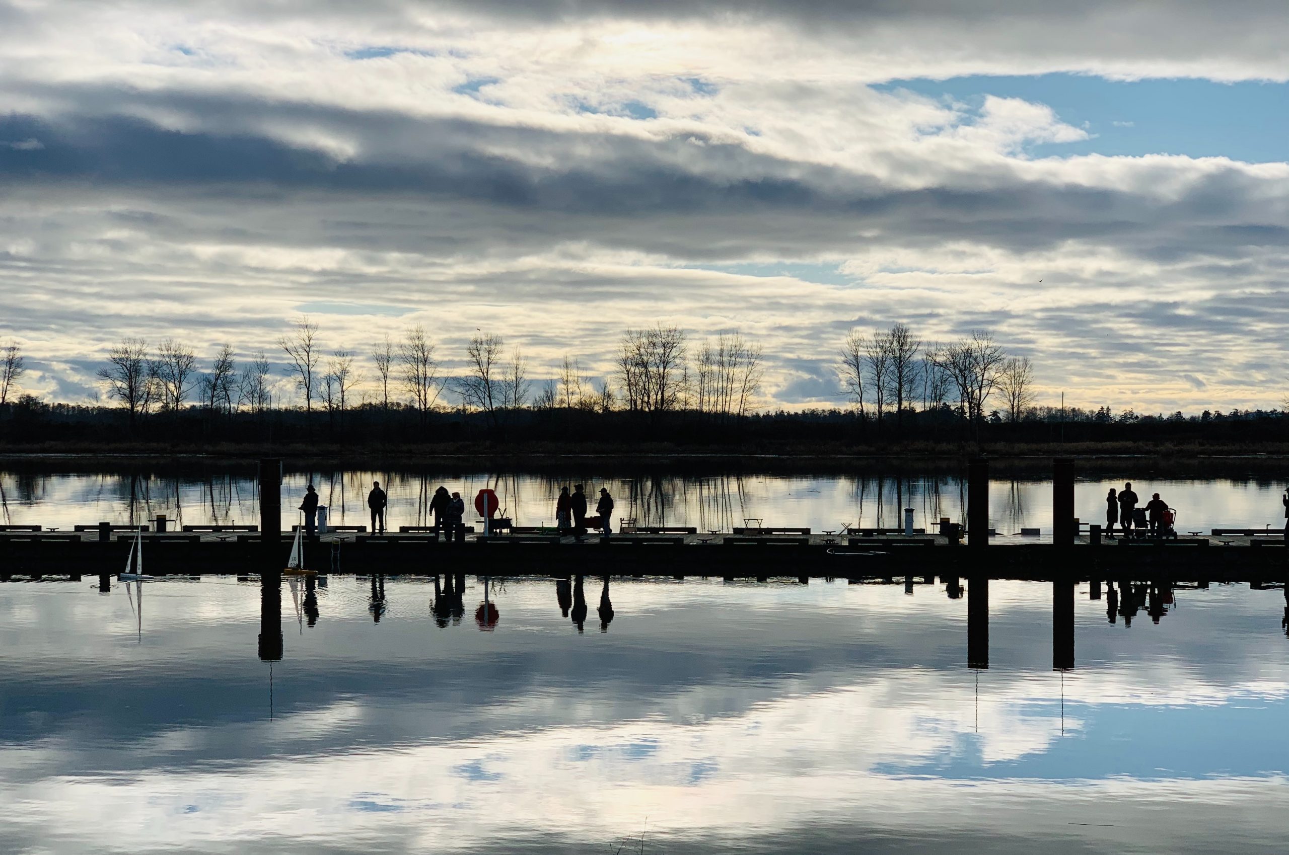 People fishing off the pier on the Fraser River in present-day Steveston (Musqueam territory).