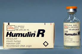 Photo showing package of Humulin R with vial next to it.
