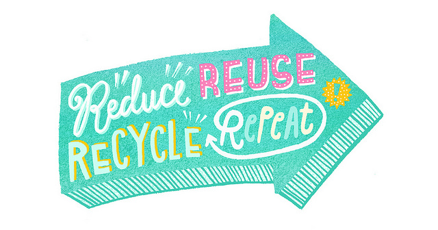 A large arrow with the words reduce, reuse, recycle, repeat on it.