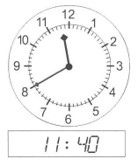 the hour hand is between 11 and 12, the minute hand is pointing at 8