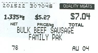 A tag for beef sausage that lists the price as $7.04.