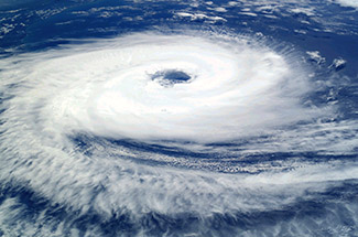 A photograph of a hurricane, showing the rotation around its eye.
