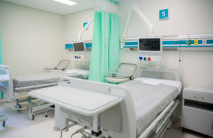 A hospital room with two beds.