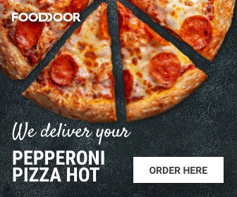 An ad for FoodDoor. It has a large picture of a pizza, the words "We deliver your pepperoni pizza hot," and an "Order Here" button.
