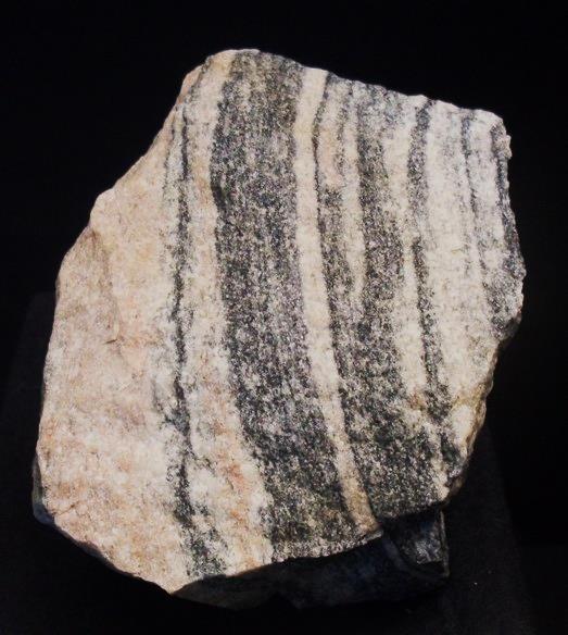 Figure 21.6 A sample of the Acasta Gneiss on display at the Natural History Museum in Vienna [https://commons.wikimedia.org/wiki/File:Acasta_gneiss.jpg]