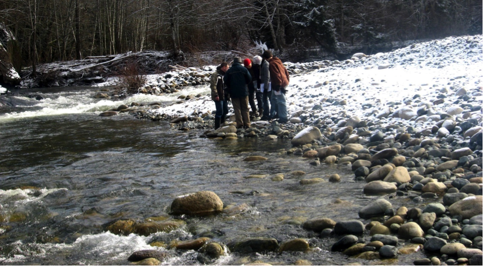 Figure 6.4 Variations in flow velocity on the Englishman River near to Parksville, B.C. When the photo was taken the river was not flowing fast enough anywhere to move the boulders and cobbles visible here, but it is fast enough when the discharge is higher.