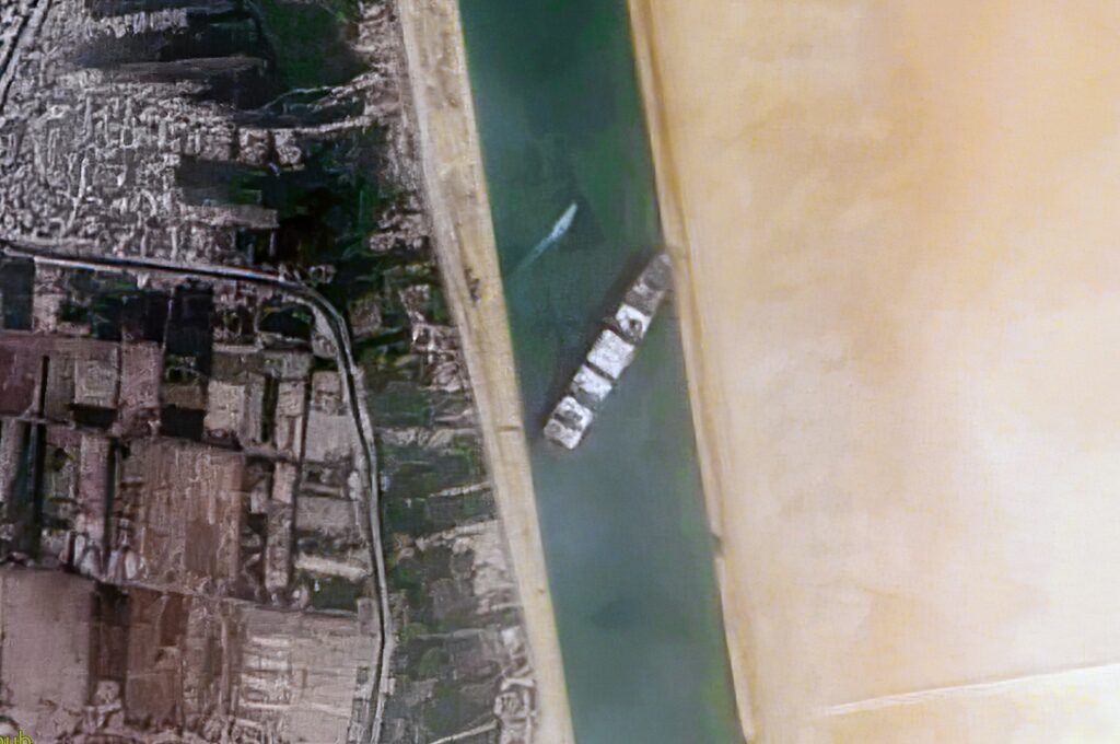 Container Ship 'Ever Given' stuck in the Suez Canal, Egypt - March 24th, 2021.