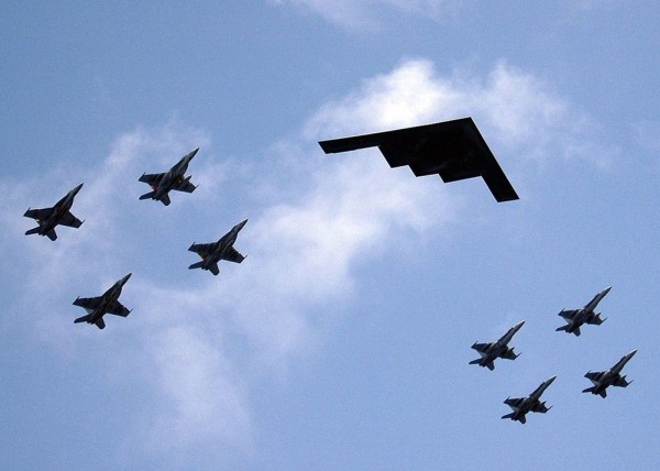 Military jets flying in formation.