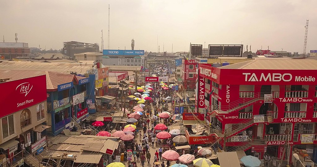 Image of a digital district selling and servicing mobile phones in an African city.