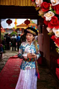 A Mosuo girl in bridesmaid costume