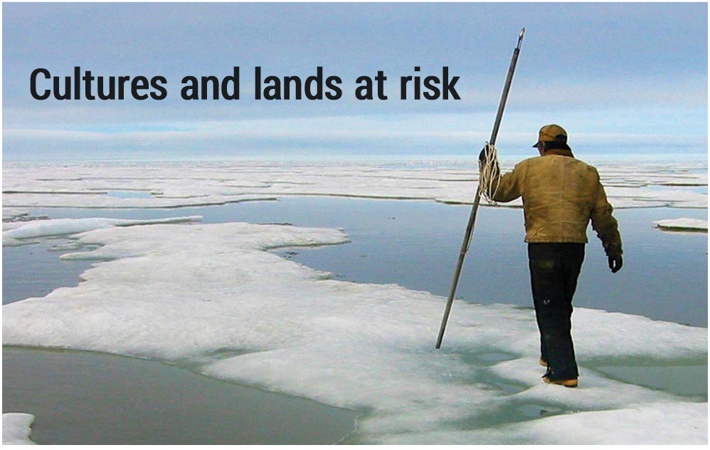 Modern Indigenous man walking carefully on thin arctic ice holding a harpoon