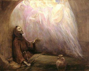 A man in a long cloak sits on the floor looking up at surrounding angels.