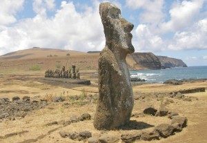 A group of tall, human-like stone statues.