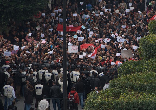 A large crowd of marching protesters