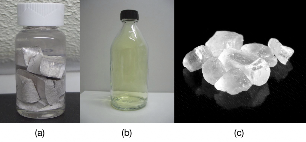 Sodium chunks, chlorine gas, and sodium chloride crystals.
