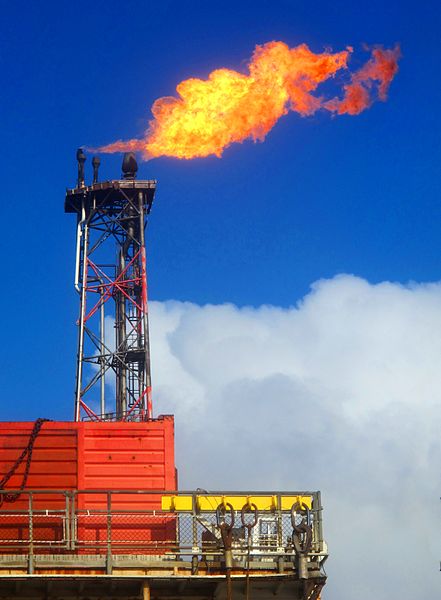 The combustion of hydrocarbons is a primary source of energy in our society. First gas from the Oselvar module on the Ula platform on April 14th, 2012 by Varodrig under a CC BY SA license.