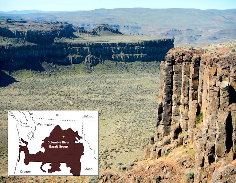 Part of the Columbia River Basalt Group at Frenchman Coulee, eastern Washington, United States. All of the flows visible here have formed large (up to two metres in diameter) columnar basalts, a result of relatively slow cooling of flows that are tens of m thick. The inset map shows the approximate extent of the 17 to 14 Ma Columbia River Basalts, with the location of the photo shown as a star. 