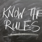 A chalkboard message that reads, Know the rules!