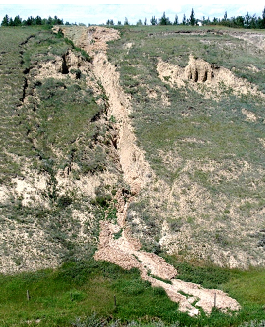 A slump (left) and an associated mudflow (center).