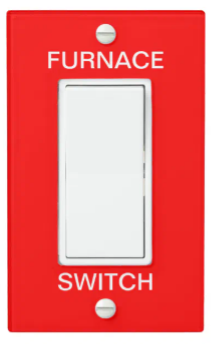 A switch with a red switch cover and the words “Furnace switch” in bold letters.