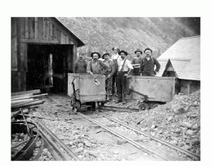Southeastern British Columbia was, in the 1890s, a constellation of small-to-middling mining towns. These hardrock miners from the Tariff Mine near Ainsworth were heavily influenced by labour organizations out of the nearest metropolis: Spokane, Washington. (BC Archives) https://upload.wikimedia.org/wikipedia/commons/3/36/Tariff_Mine_near_Ainsworth.gif