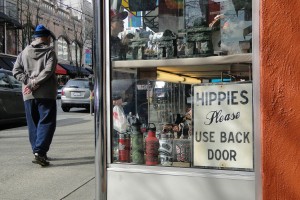 Sign of the times. An anti-hippy notice survives in a Vancouver antique store. (Photo: Adam Jones) https://commons.wikimedia.org/wiki/File:Hippies_Please_Use_Back_Door_-_Antique_Sign_-_Robson_Street_-_Vancouver_BC_-_Canada.jpg