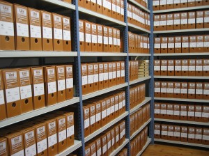 Shelves of documents in boxes.