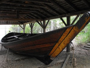 A large, canoe-like boat with gradually sloping sides.