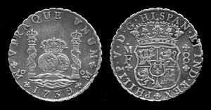 Silver coins with rough edges. Both contain images of a crown.