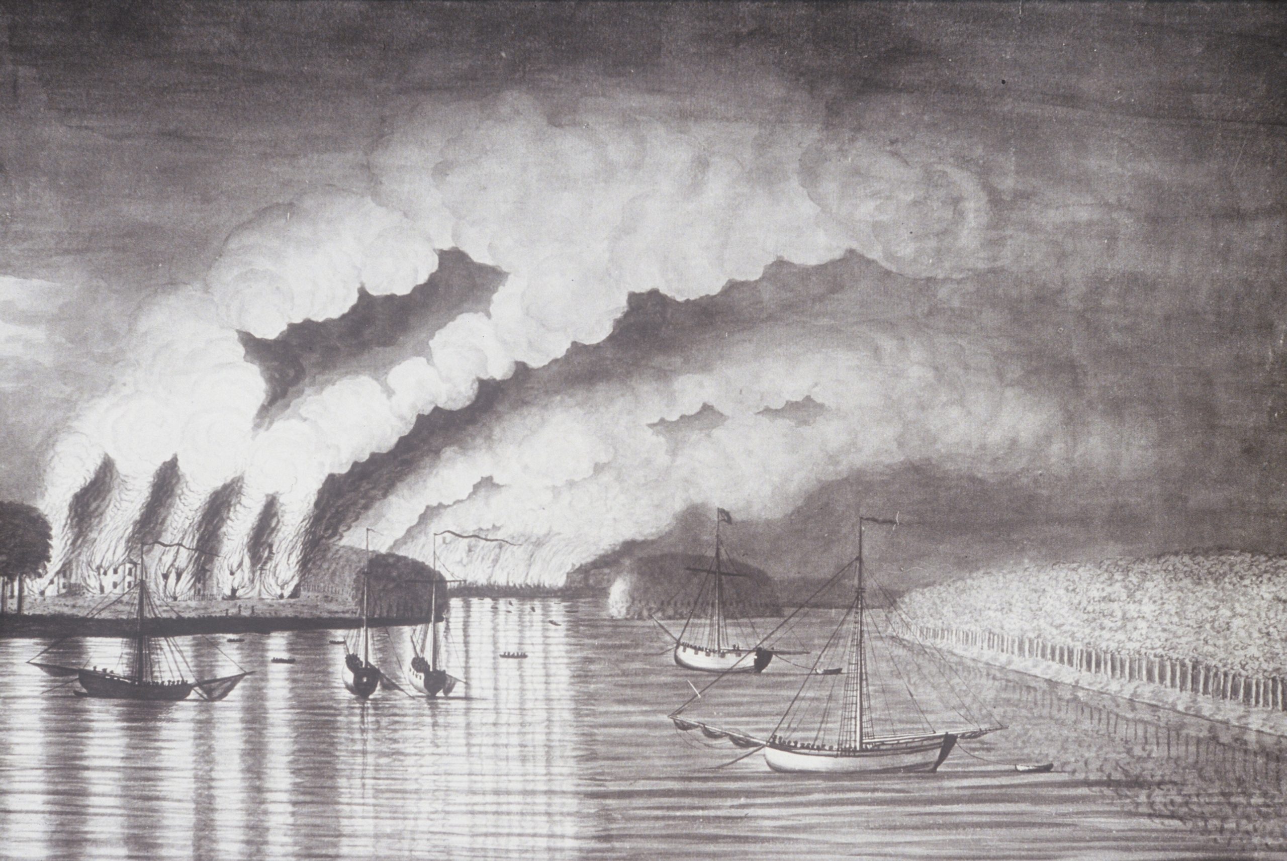 Sailboats float near a shore where many fires burn. Smoke billows to the sky.