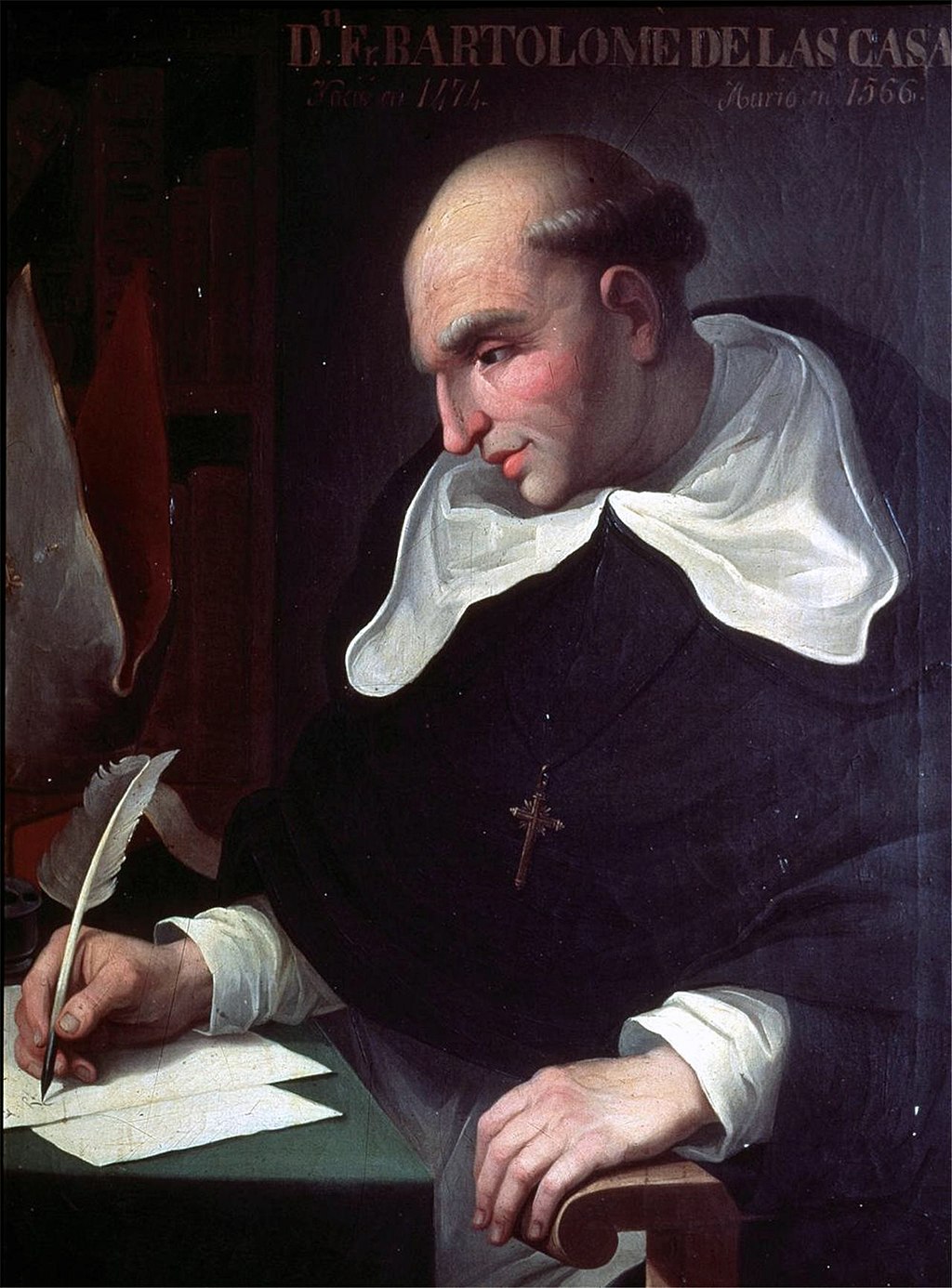 Painting of a friar in a black robe, writing with a quill.