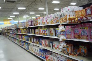 A cereal aisle in a grovery store.