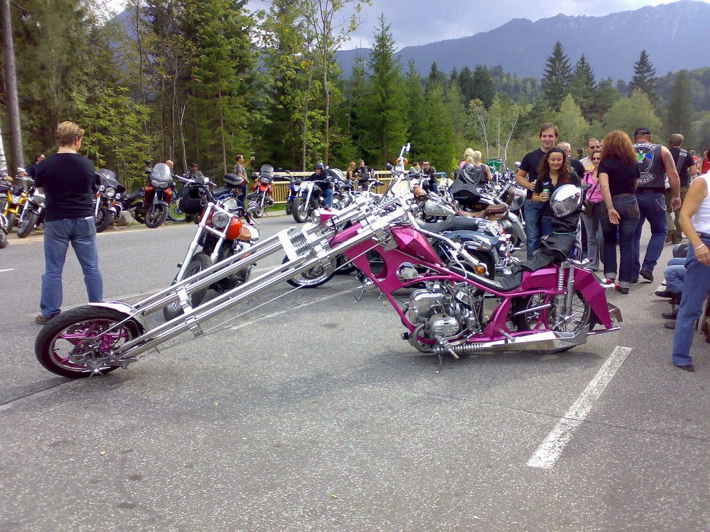 A pink custom motorcycle.