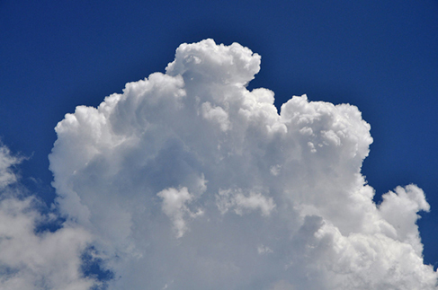 Photograph of a cumulus cloud.