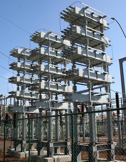 Photograph of power capacitors at a power station.